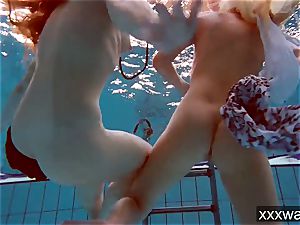 sizzling Russian ladies swimming in the pool
